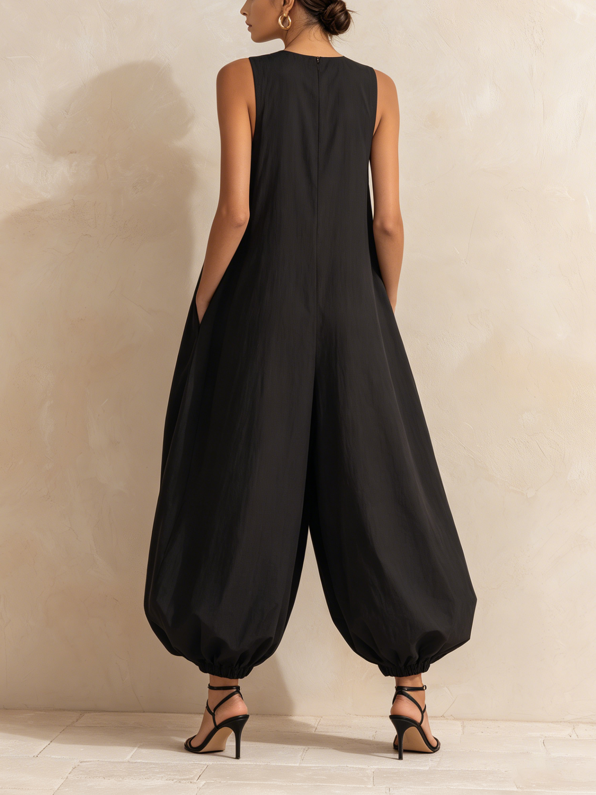 Black Sleeveless Jumpsuit with Balloon Legs and Pockets