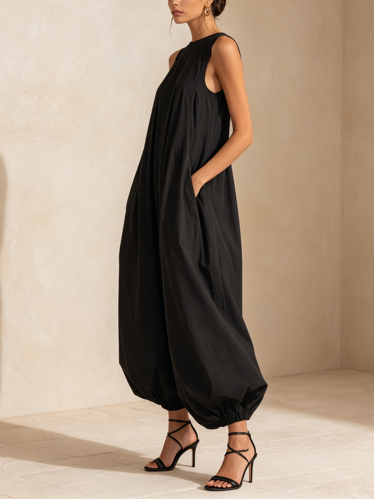 Black Sleeveless Jumpsuit with Balloon Legs and Pockets